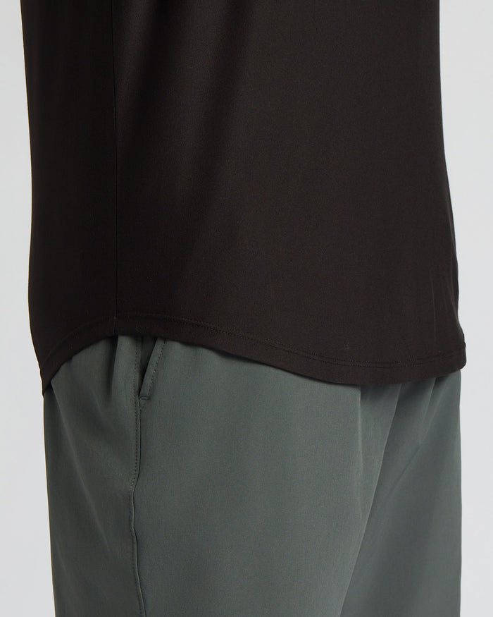Close-up of the curved hem detail on the All Black Active Curved Hem Crew 6-Pack, highlighting the smooth black fabric as part of men's basics clothing.