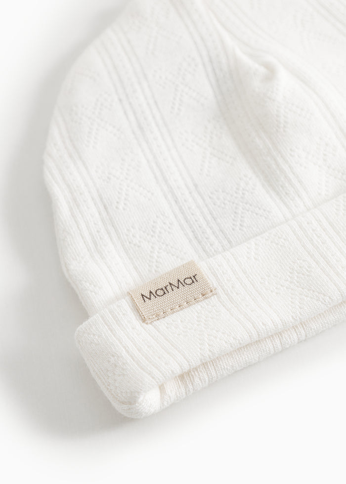 White baby hoodie with stripe, MarMar logo label, and ribbed trim.