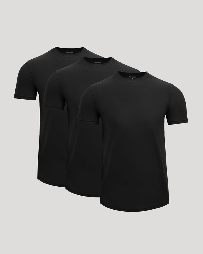 Three black t-shirts with a pocket on a light gray background