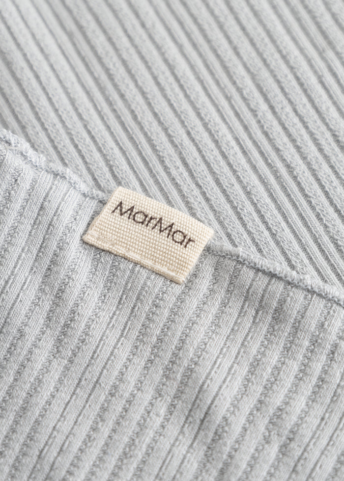 Lace-stitched striped scarf with woven logo and ribbed edge.