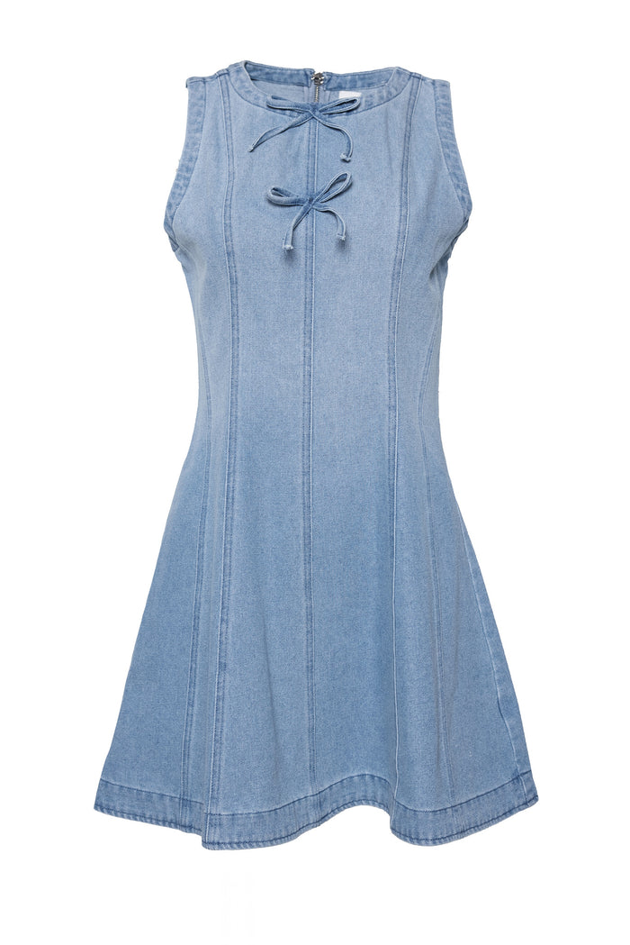 The Austin Dress in Light Wash Denim by Ivy City Co is a sleeveless mini dress with vertical seams, a flared hem, and lace-up neckline detail. Made from stretch fabric for comfort. Shown on a white background.