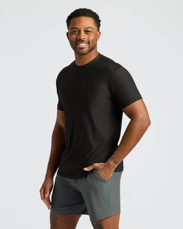 Man in Black Friday Activewear Doorbuster 6-Pack, smiling.