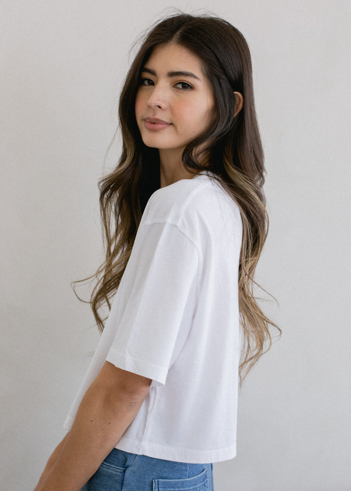 Side view of Boxy Crop Tee on model