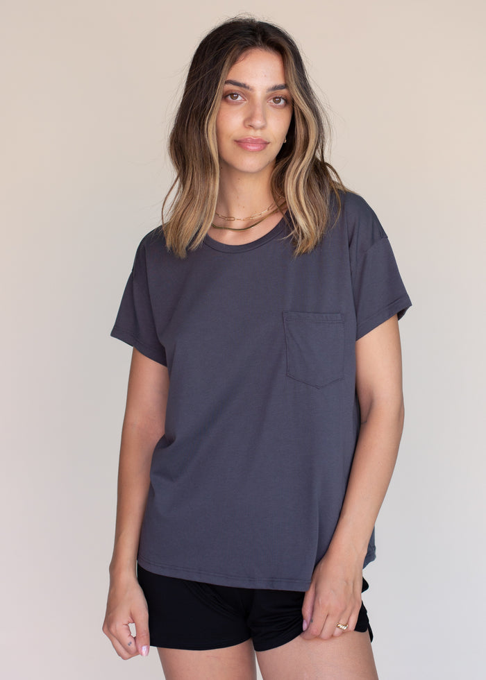 woman wearing boxy tee with pocket in charcoal