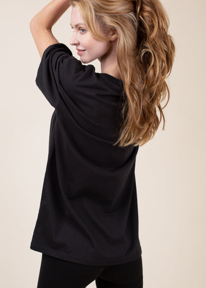 woman wearing oversized boyfriend tee in black