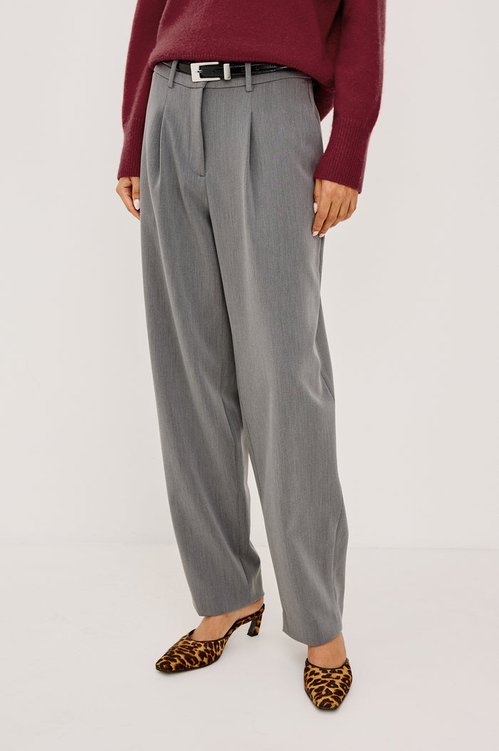 Cameron Pant in Springy Suiting Fabric With High-Rise, Pleated Barrel Legs That Taper, Side and Back Pockets, and Unlined in Heather Grey Colorway - Lower Body Front View Featured on Model