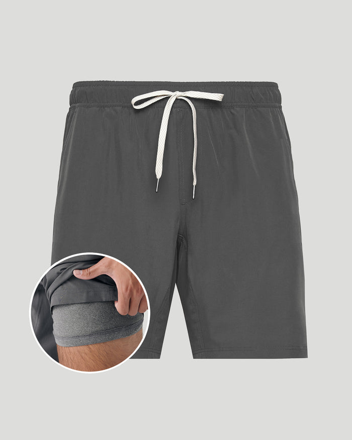 Gray shorts with a drawstring on a light gray background, with a close-up inset showing the waistband.