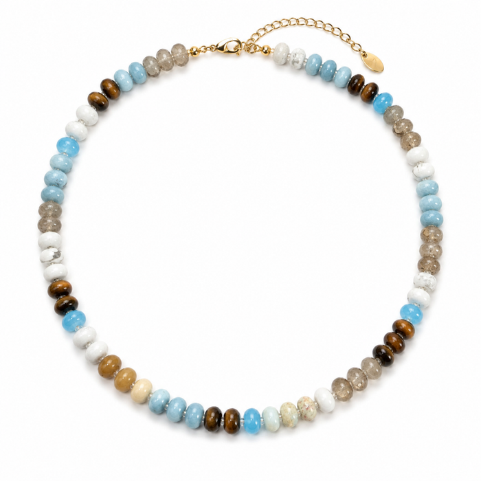 A beaded choker necklace featuring a mix of light blue, brown, white, beige, and gray gemstone beads, accented by a gold chain extender and clasp, shown on a plain white background.