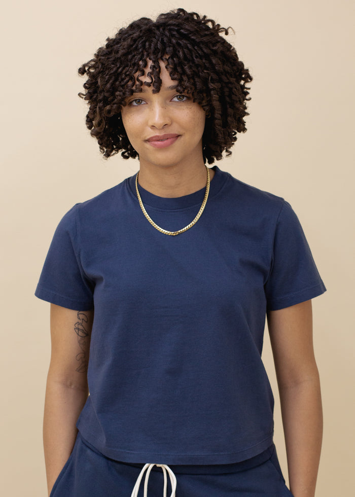 woman wearing basic crop tee in midnight