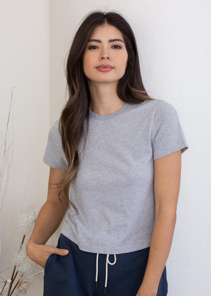 woman wearing crop tee in heather grey