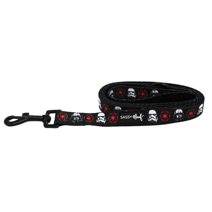 The Sassy Woof Dog Leash - STAR WARS™ The Dark Side features stormtrooper helmets and red Imperial emblems, a sturdy metal clip, the Sassy Woof logo, and a soft neoprene handle for comfort.