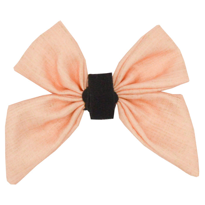 The Sassy Woof Dog Sailor Bow - Pinot features wide, peach-toned textured loops and tails with a black center band—perfect for stylish pups. Displayed against a white background.