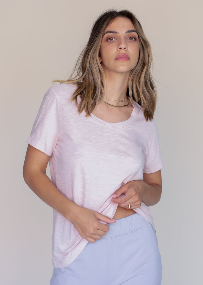 woman wearing relaxed slub tee in light pink