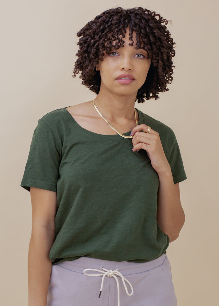 woman wearing relaxed slub tee in green