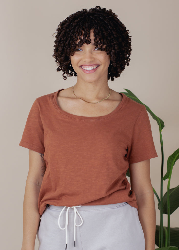 woman wearing relaxed slub tee in rust