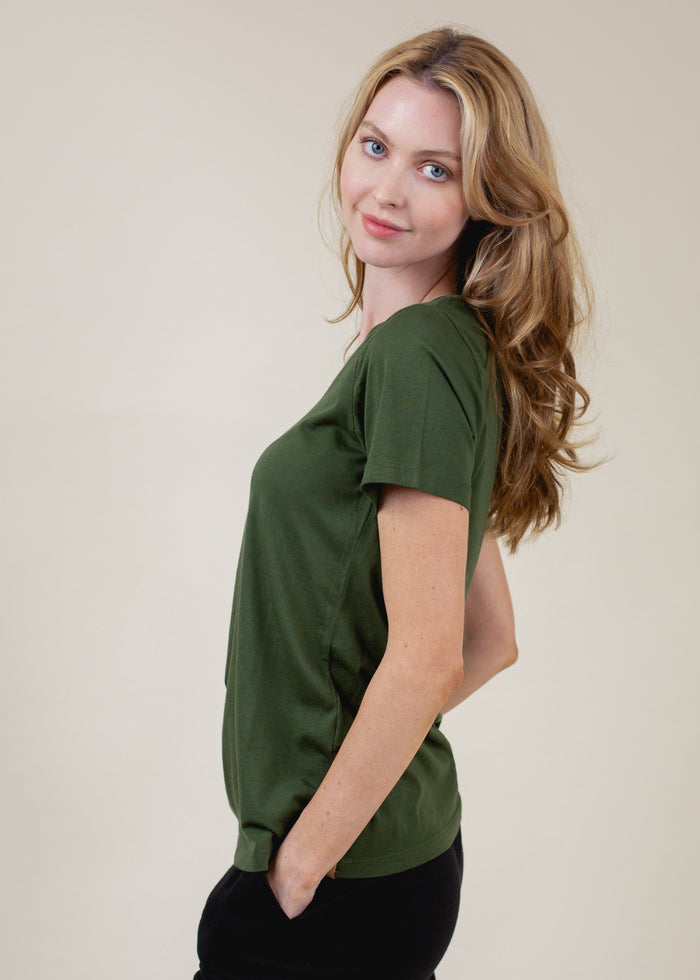 side view ofwoman wearing relaxed crewneck tee in green