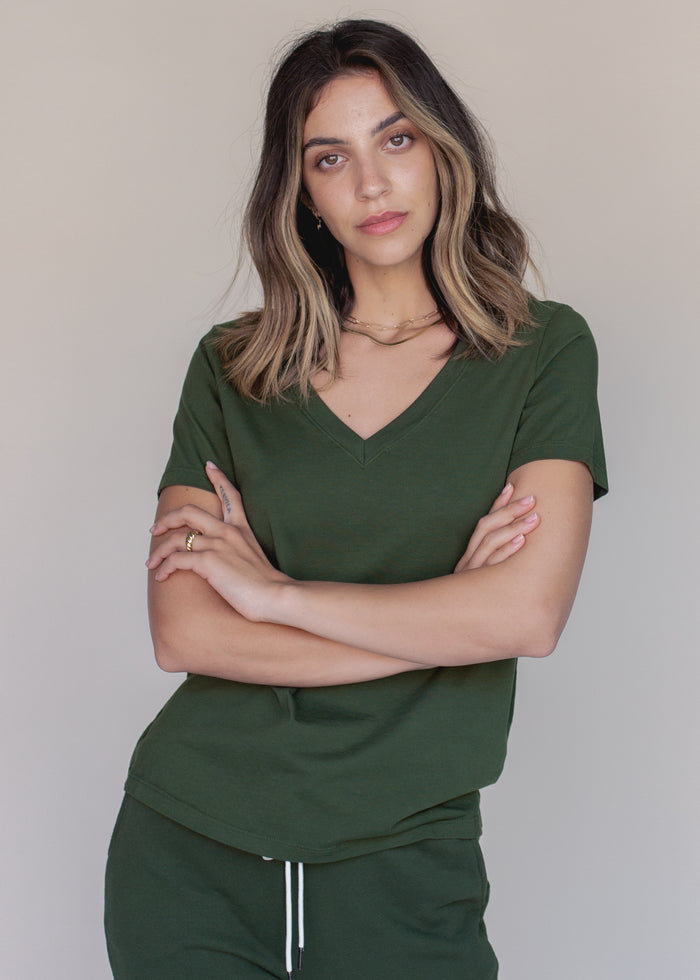 woman wearing green vneck tee