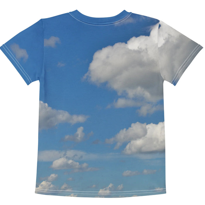 Flying Hamburger Dog Kid's Tee - The stoic, squinting Chihuahua riding a cheeseburger cluster against a #367BC3 stratosphere azure backdrop, accented by #F0F8FF cumulus white clouds and #CD853F toasted sesame bun details.