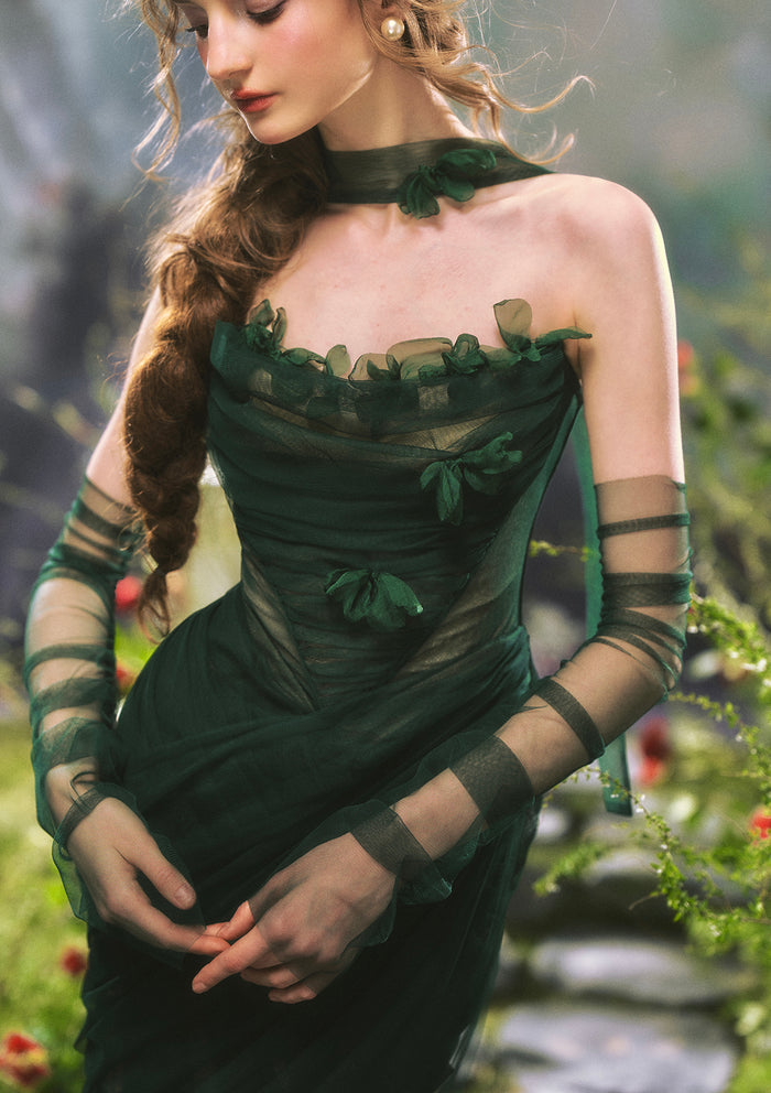 Close-up of hand-sewn flowers and pleated layers on Lacemade "Forest Muse"