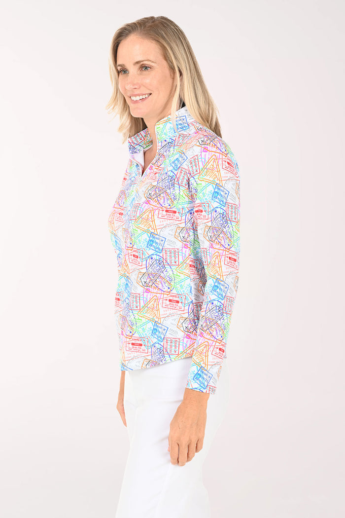 Woman wearing a colorful patterned blouse on a white background