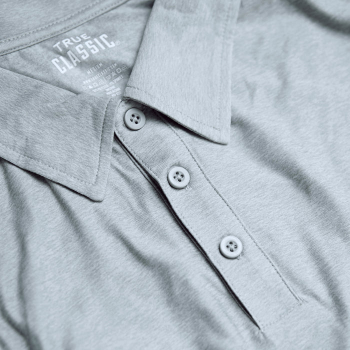 Heather Light Gray Active Polo with spread collar and three-button placket.
