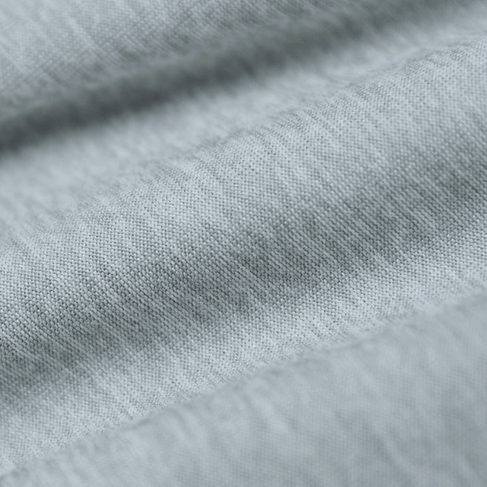 Heather Light Gray Active Polo fabric close-up showing fine knit pattern.