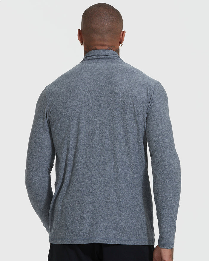 Man wearing Heather Navy Active Quarter Zip Shirt, showcasing its athletic fit.