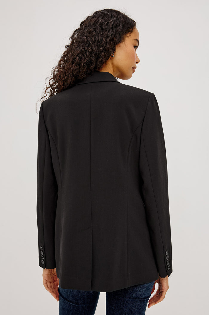 Jac Blazer in Wool Blend With Double-Breasted Design, Notched Lapels, Long Sleeves, Side Flap Pockets, and Fully Lined in Black Colorway - Upper Body Back View Featured on Model