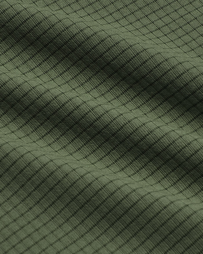 Kelp Sleeveless Active Mesh Tank with waffle-weave texture and athletic fit.