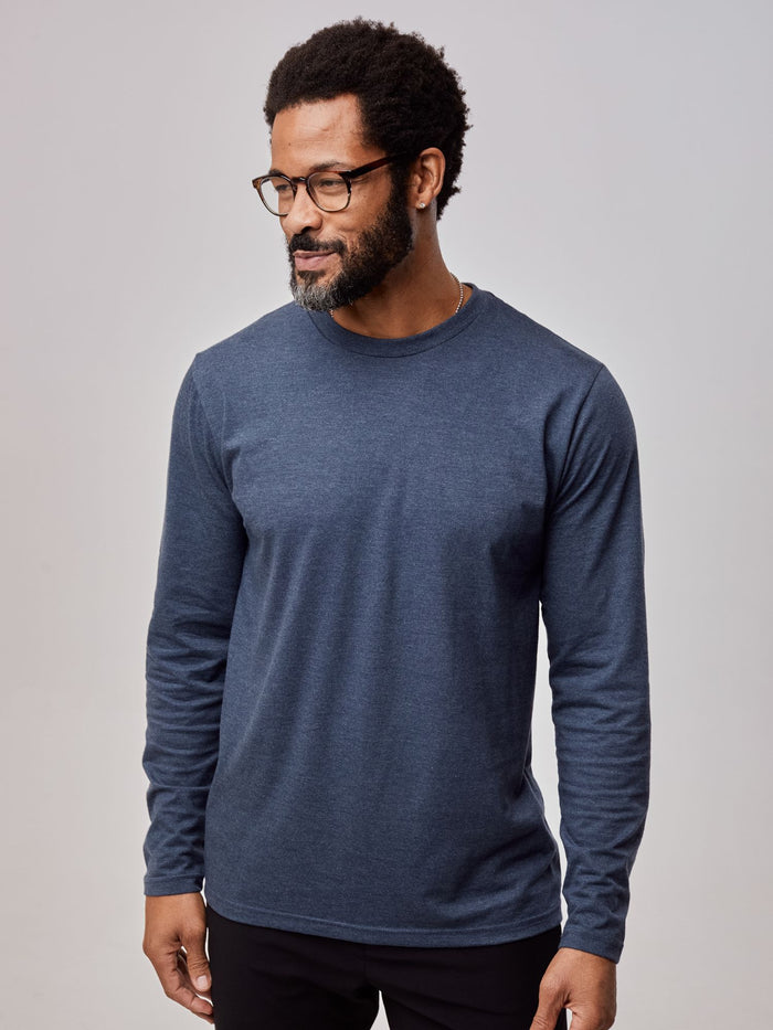 Jarrett is 6', 168lbs and wears a size M # Navy Blue Long Sleeve Crew Neck Tee | Fresh Clean Threads