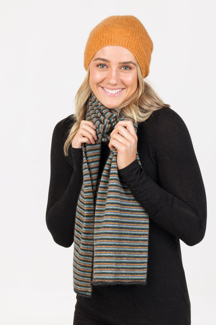 Woman wearing Native World - Merino & Possum Six Colour Scarf (NX894) in the colour combination Charcoal.