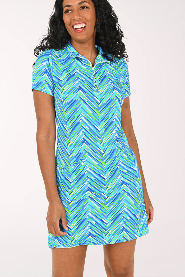 Woman wearing a blue chevron short sleeve dress
