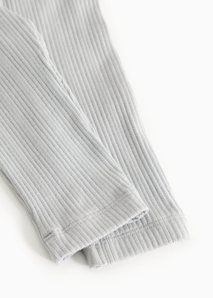 Piva rib-strapped trousers in light gray with elastic cuffs and seam details.