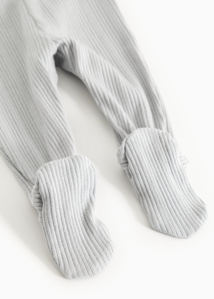 Ribbed baby pants with ribbed cuffs at the ankles.
