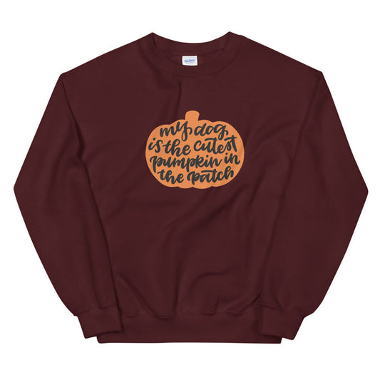 The Sassy Woof Sweatshirt - My Dog is the Cutest Pumpkin in the Patch features a maroon color, orange pumpkin graphic, and playful script—perfect for fall and dog lovers looking for a cozy unisex option.