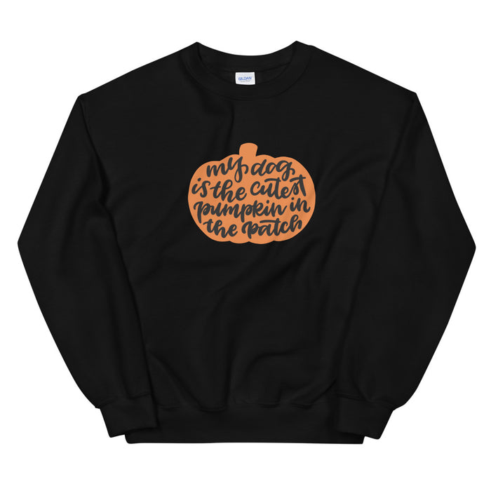The Sassy Woof Sweatshirt - My Dog is the Cutest Pumpkin in the Patch is a unisex black fall sweatshirt featuring an orange pumpkin graphic and playful “My dog is the cutest pumpkin in the patch” script on the front.