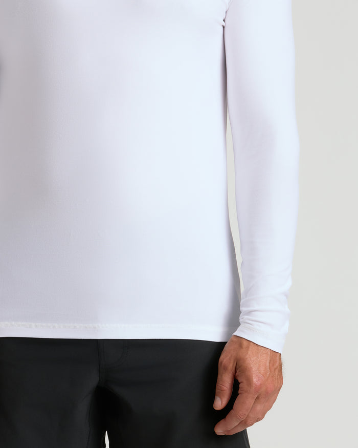 White Active Long Sleeve Crew T-Shirt worn by person with black pants.